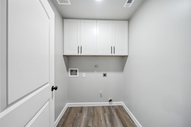 laundry room featuring cabinet space, visible vents, gas dryer hookup, hookup for a washing machine, and electric dryer hookup