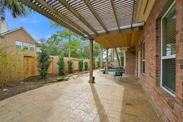 view of patio / terrace featuring a fenced backyard and a pergola