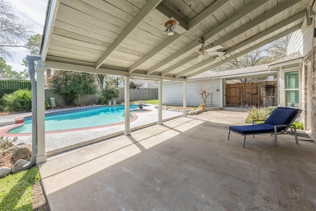 view of pool featuring a patio area, a fenced backyard, and a fenced in pool