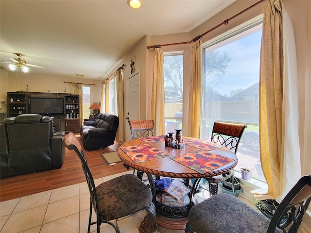 8002 Weeping Willow Pl, Missouri City, TX 77459 - dining room featuring light tile patterned floors and a ceiling fan