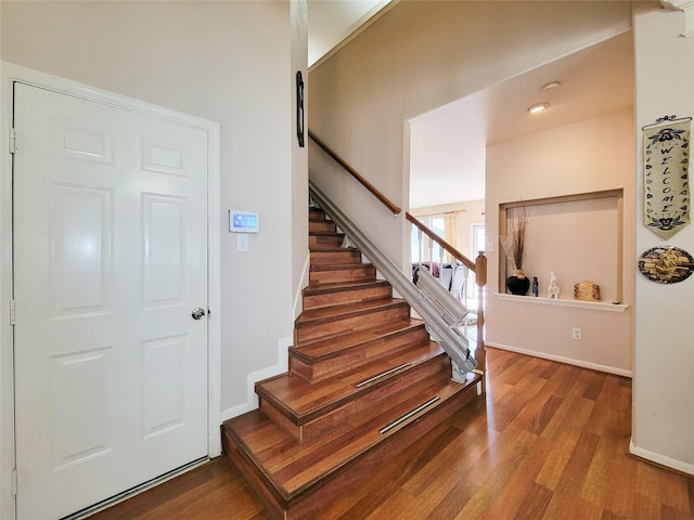 8002 Weeping Willow Pl, Missouri City, TX 77459 - stairway with wood finished floors and baseboards
