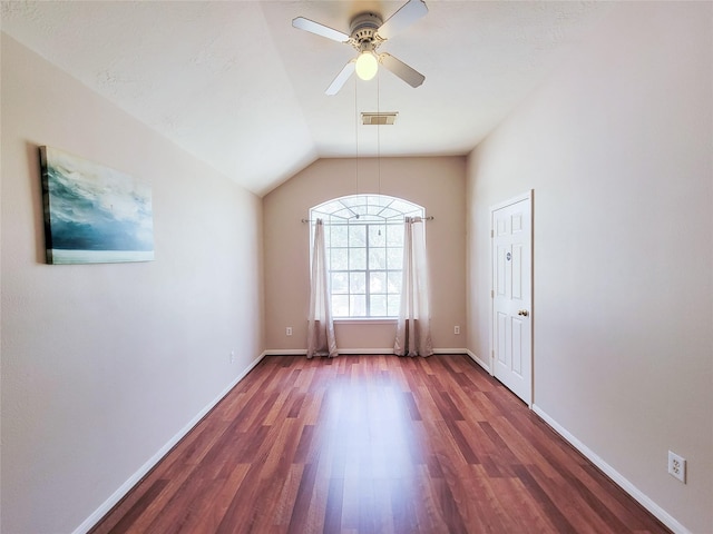 8002 Weeping Willow Pl, Missouri City, TX 77459 - spare room featuring a ceiling fan, wood finished floors, visible vents, baseboards, and vaulted ceiling