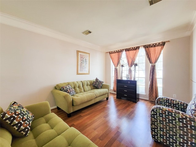 8002 Weeping Willow Pl, Missouri City, TX 77459 - living room featuring visible vents, ornamental molding, and wood finished floors