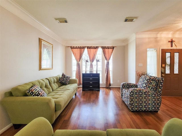 8002 Weeping Willow Pl, Missouri City, TX 77459 - living room featuring visible vents, ornamental molding, baseboards, and wood finished floors
