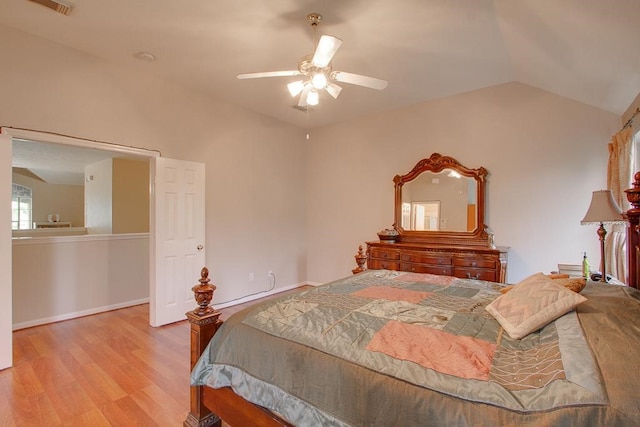8002 Weeping Willow Pl, Missouri City, TX 77459 - bedroom with ceiling fan, baseboards, lofted ceiling, and wood finished floors