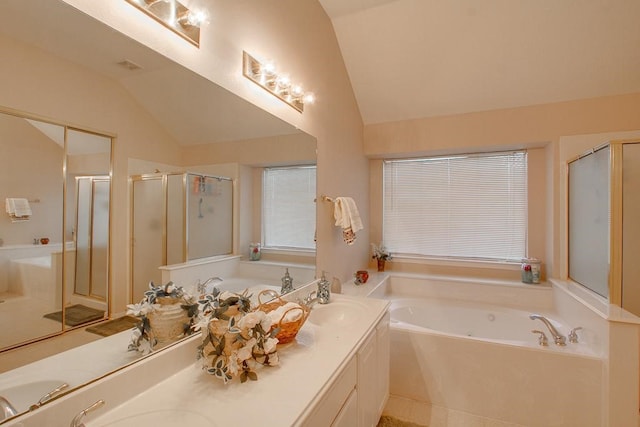 8002 Weeping Willow Pl, Missouri City, TX 77459 - bathroom with double vanity, lofted ceiling, a bath, and a shower stall