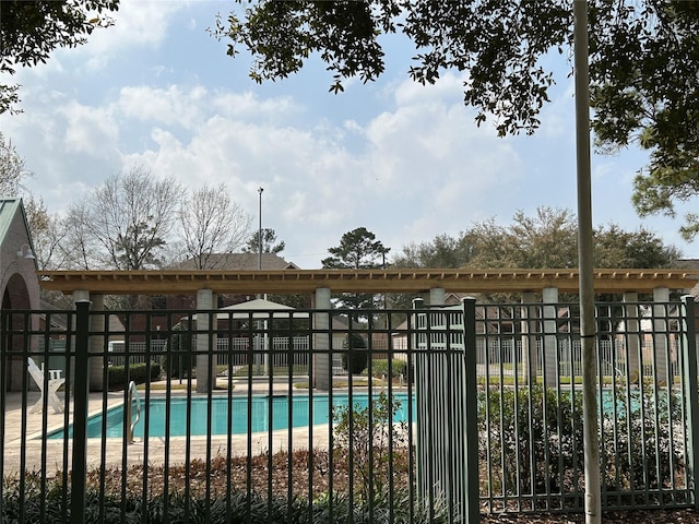 pool featuring fence