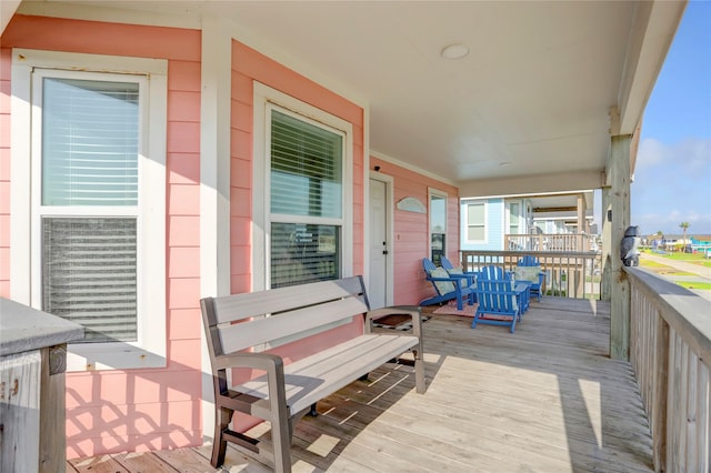 wooden deck featuring a porch