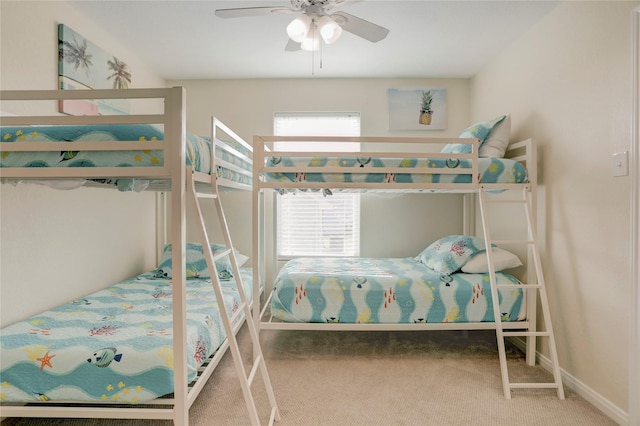 bedroom with carpet floors and a ceiling fan