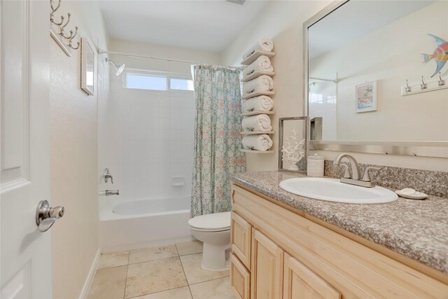 4122 Reeves Dr, Galveston, TX 77554 - bathroom featuring vanity, toilet, shower / tub combo, and tile patterned flooring