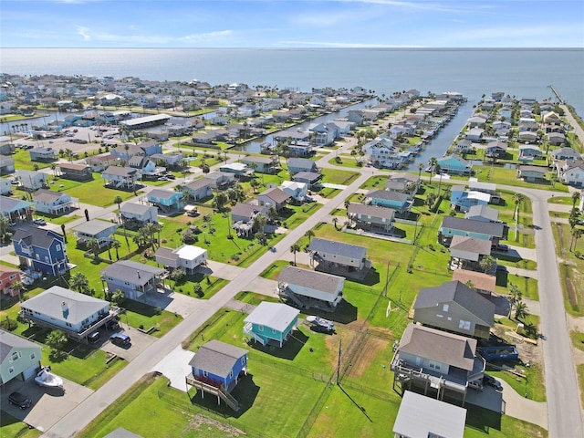 aerial view featuring a water view and a residential view