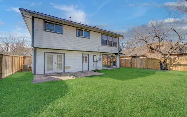 12710 Ashford Meadow Dr, Houston, TX 77082 - rear view of house with a patio area, a fenced backyard, central AC, and a yard
