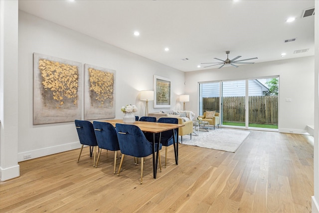 dining area with recessed lighting, visible vents, and light wood finished floors