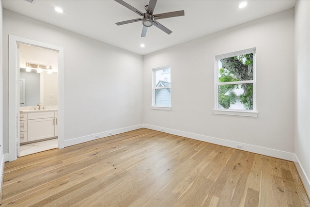 902 Knox St Unit A, Houston, TX 77007 - unfurnished bedroom featuring light wood finished floors, recessed lighting, connected bathroom, and a ceiling fan