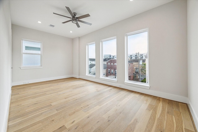 902 Knox St Unit A, Houston, TX 77007 - empty room featuring healthy amount of natural light, light wood-type flooring, ceiling fan, and recessed lighting