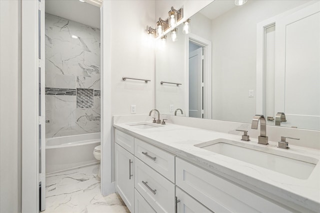 902 Knox St Unit A, Houston, TX 77007 - bathroom with marble look tile flooring, double vanity, and shower / tub combination