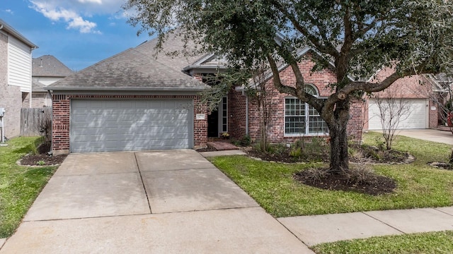 view of front of home featuring a garage, brick siding, driveway, and a shingled roof