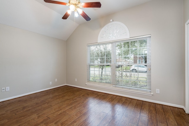 unfurnished room with a ceiling fan, lofted ceiling, wood finished floors, and baseboards