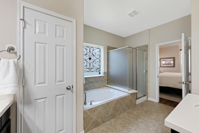 full bath featuring a stall shower, visible vents, a garden tub, and vanity