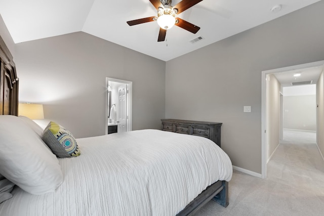 bedroom with light carpet, baseboards, visible vents, and vaulted ceiling