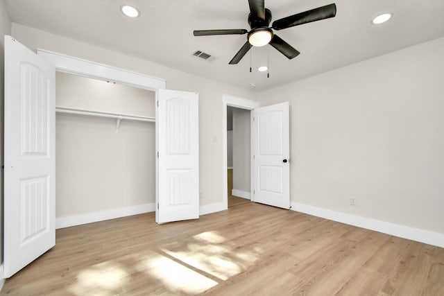 unfurnished bedroom with recessed lighting, visible vents, baseboards, and wood finished floors