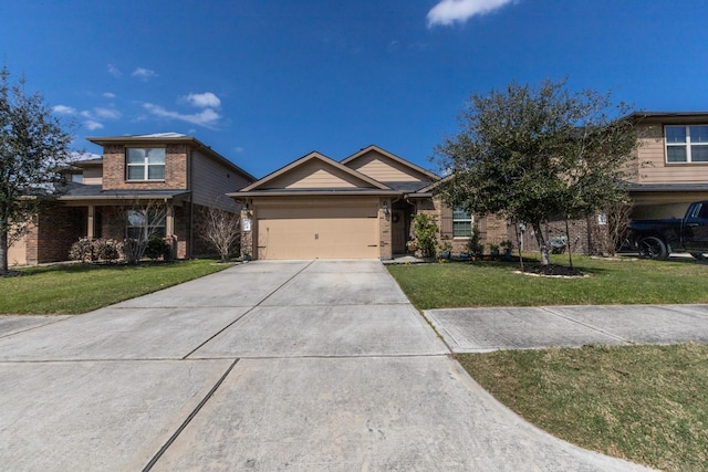 view of front of home with a garage, concrete driveway, brick siding, and a front yard