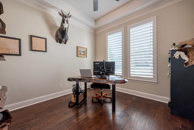 office space featuring crown molding, wood-type flooring, a ceiling fan, and baseboards