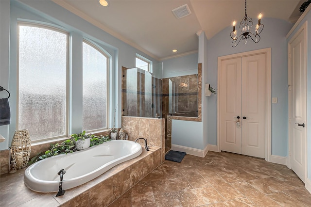 bathroom with a walk in shower, a chandelier, visible vents, ornamental molding, and a bath