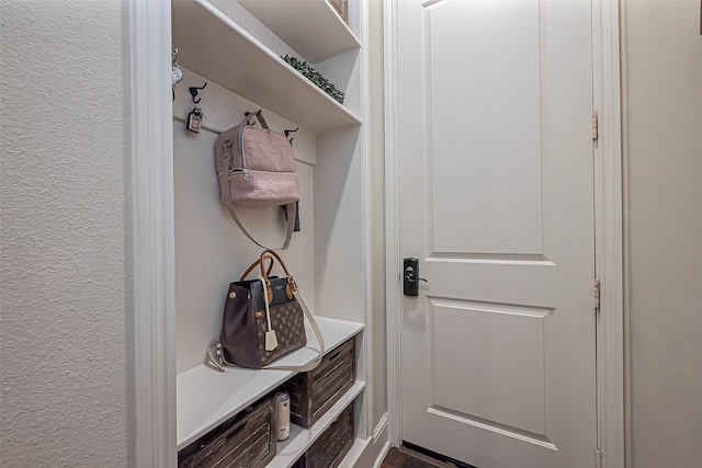 mudroom featuring a textured wall