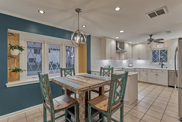 dining area with recessed lighting, visible vents, light tile patterned flooring, baseboards, and ceiling fan with notable chandelier