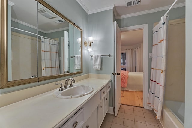 full bath featuring visible vents, ensuite bath, tile patterned floors, crown molding, and vanity