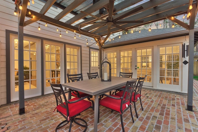 sunroom featuring beamed ceiling