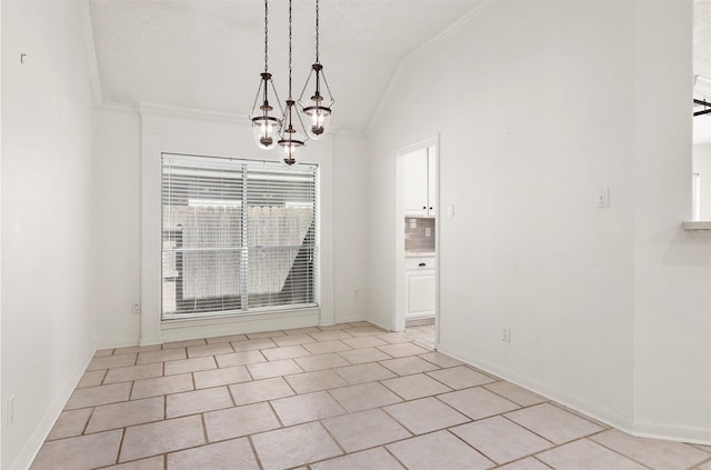 unfurnished dining area featuring a chandelier, baseboards, lofted ceiling, and crown molding