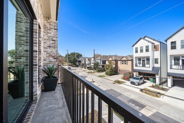 balcony featuring a residential view