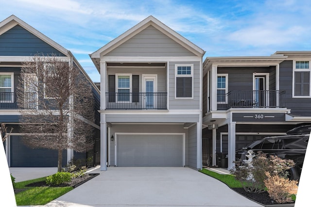 view of front of house with a garage and concrete driveway