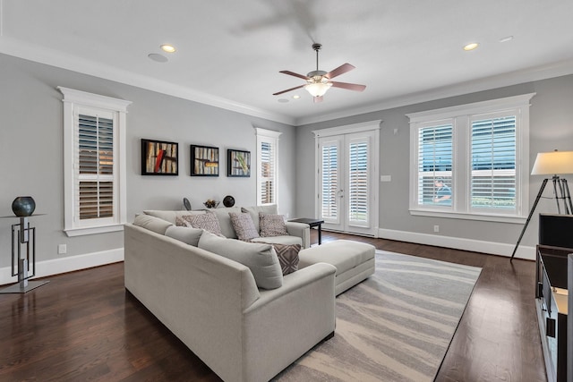 living room with ornamental molding, recessed lighting, dark wood-type flooring, and baseboards