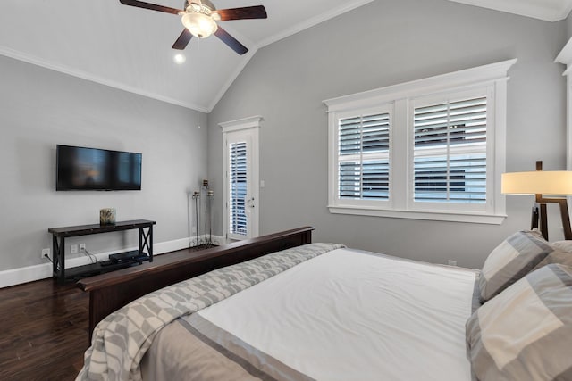 bedroom featuring ornamental molding, vaulted ceiling, baseboards, and wood finished floors