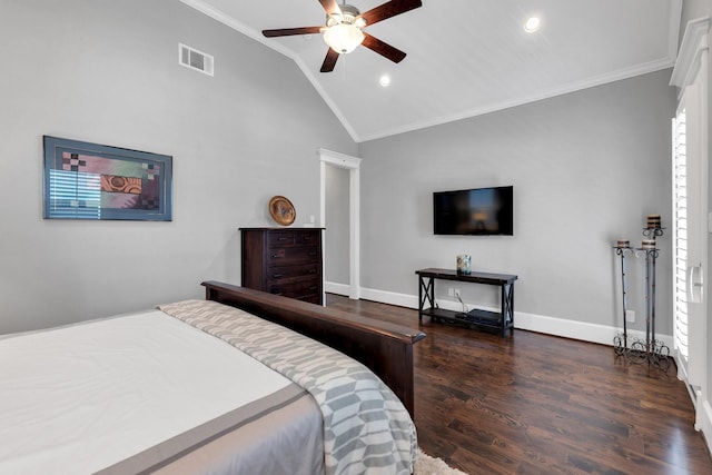 bedroom featuring lofted ceiling, wood finished floors, visible vents, and crown molding