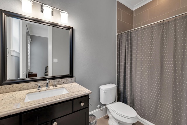 bathroom with a shower with shower curtain, toilet, ornamental molding, vanity, and baseboards