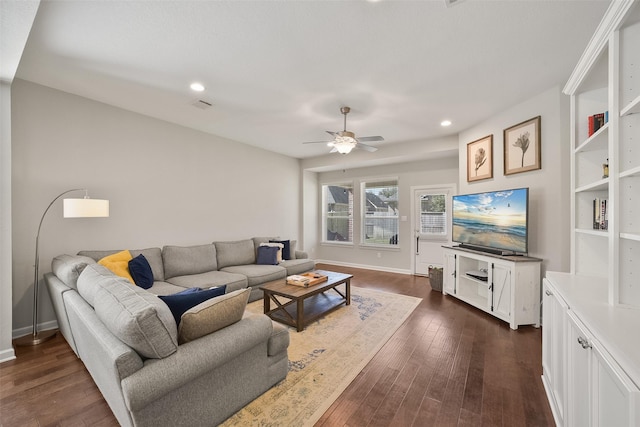 living area with dark wood-style floors, baseboards, a ceiling fan, and recessed lighting