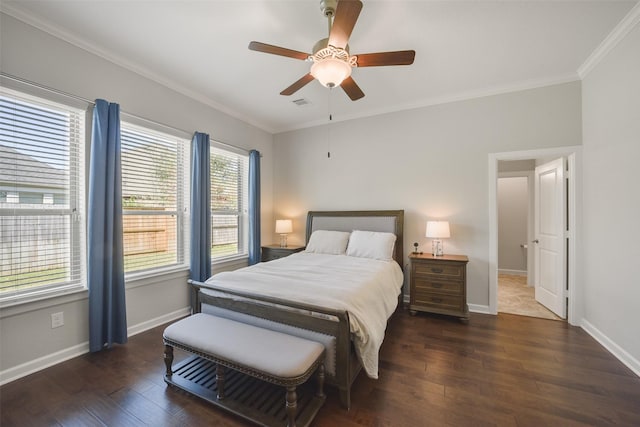 bedroom featuring wood-type flooring, crown molding, and baseboards