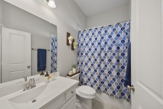 full bathroom with shower / bath combo, tile patterned flooring, vanity, and toilet