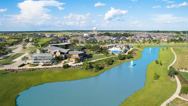 bird's eye view with a water view and a residential view