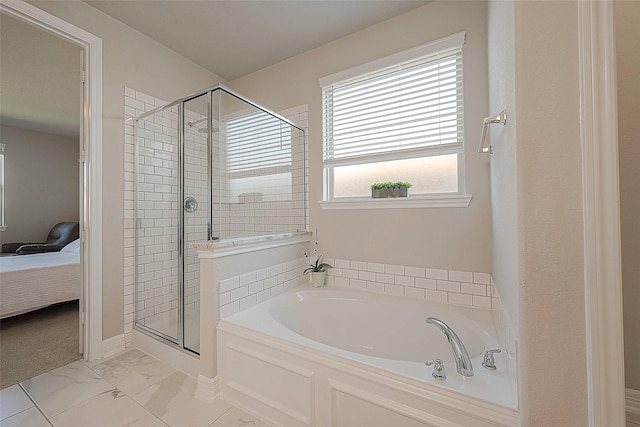 full bath featuring a stall shower, connected bathroom, marble finish floor, and a bath