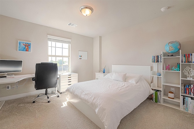 bedroom featuring carpet flooring, baseboards, and visible vents