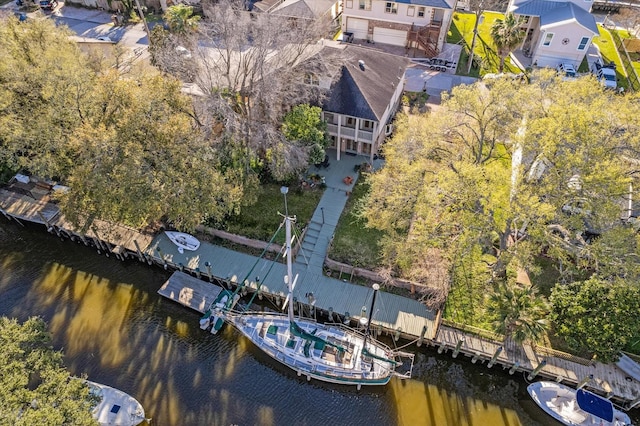 bird's eye view with a residential view and a water view