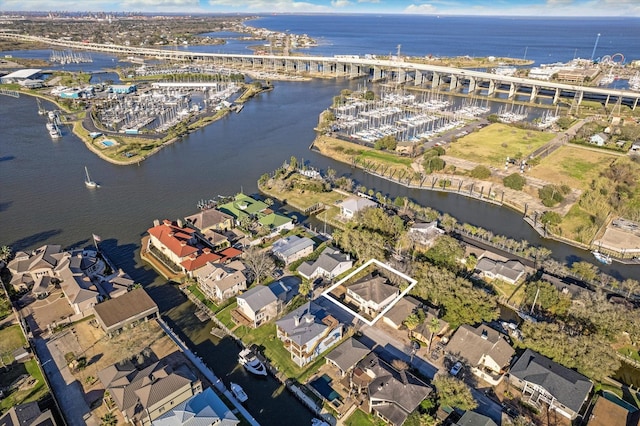 birds eye view of property featuring a water view