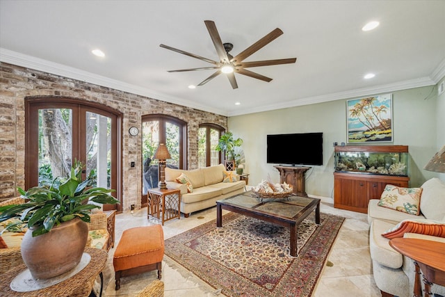 living area with french doors, light tile patterned floors, recessed lighting, ornamental molding, and a ceiling fan