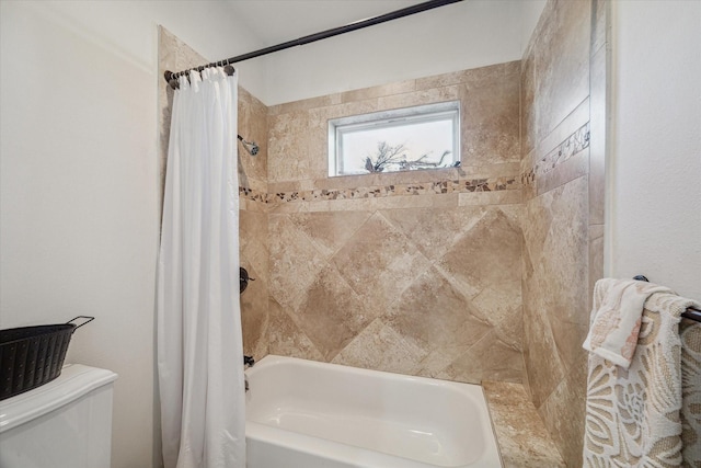 full bath with toilet and shower / tub combo