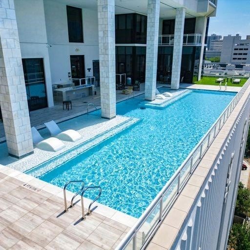 pool featuring a patio area